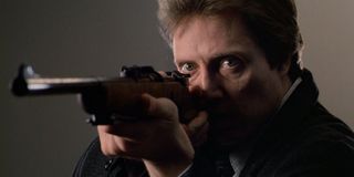 Christopher Walken as Johnny Smith aiming a gun in The Dead Zone