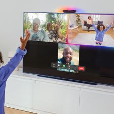 Sky Glass with Sky Live device with a family on video call