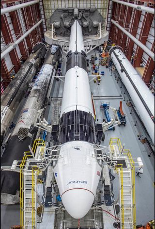 SpaceX's first Crew Dragon spacecraft to carry astronauts is mated to its Falcon 9 rocket ahead of the May 27, 2020 launch of its Demo-2 mission, a test flight to carry two astronauts to the International Space Station.