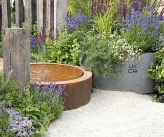 water feature in gravel garden