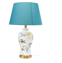 Floral White Ceramic Table Lamp With Teal ShadeNow $79.99 at Walmart&nbsp;