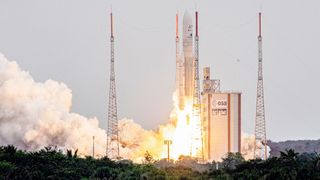 An Ariane 5 rocket with the James Webb Space Telescope Launch disappearing into the clouds covering European Space Center in Kourou, French Guiana on Dec. 25, 2021..