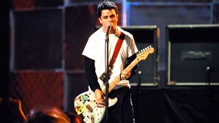 Billie Joe Armstrong playing live with Green Day in the 90s