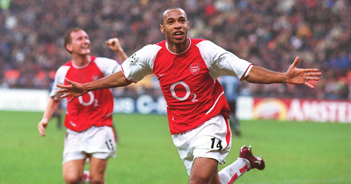 Thierry Henry celebrates scoring his 2nd goal, Arsenal&#039;s 3rd, during the Champions League Group B match between Inter Milan and Arsenal on November 25, 2003 in Milan,Italy.