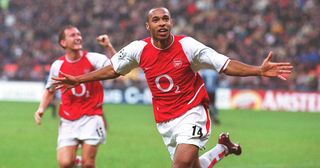 Thierry Henry celebrates scoring his 2nd goal, Arsenal's 3rd, during the Champions League Group B match between Inter Milan and Arsenal on November 25, 2003 in Milan,Italy.