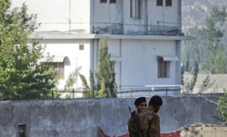 Soldiers stand guard outside Osama bin Laden&amp;#039;s Abbottabad compound