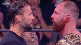 CM Punk going face-to-face with Jon Moxley