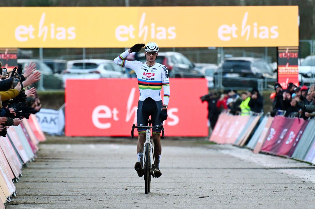 ZONHOVEN BELGIUM DECEMBER 22 Mathieu Van Der Poel of The Netherlands and Team AlpecinDeceuninck celebrates at finish line as race winner during the 28th Zonhoven UCI CycloCross Worldcup 2024 Mens Elite on December 22 2024 in Zonhoven Belgium Photo by Luc ClaessenGetty Images