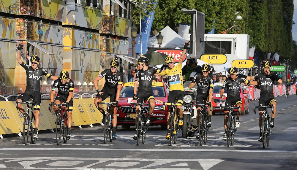 Team Sky approach the finish line of the 2015 Tour de France's final stage.