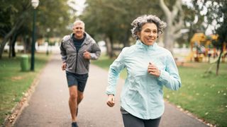 Older couple out for a run