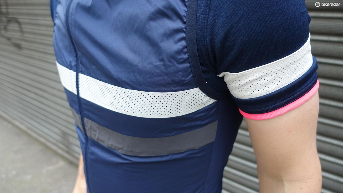 The jersey and gilet have reflective strips around the chest and arm