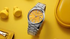 The Citizen Tsuyosa on a yellow background