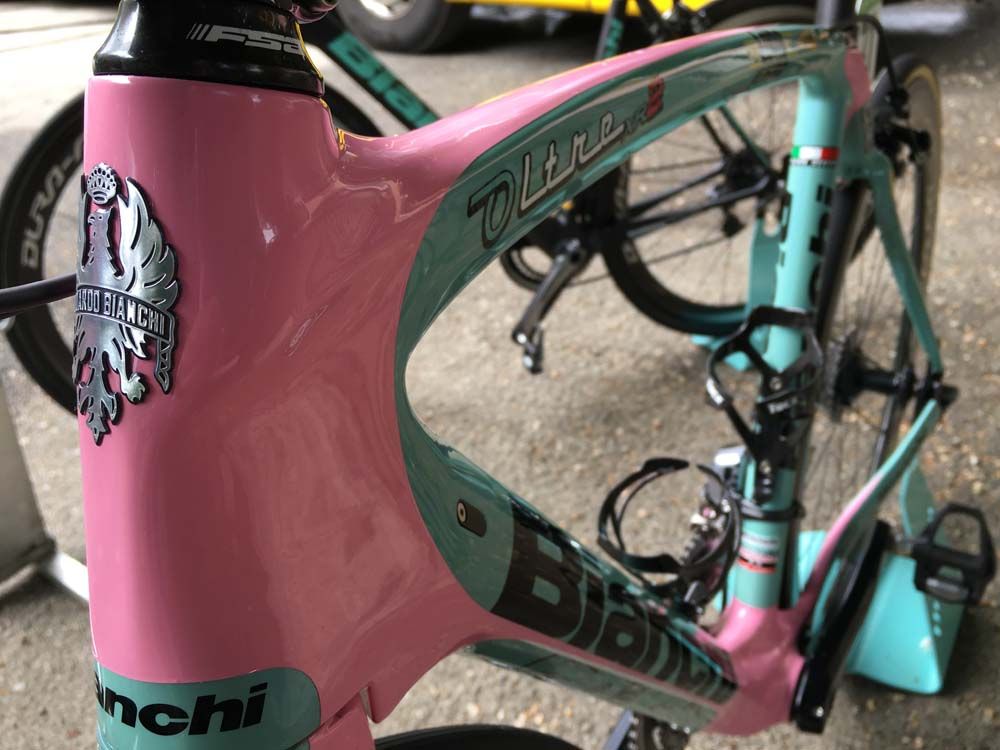The Bianchi logo on the front of the bike