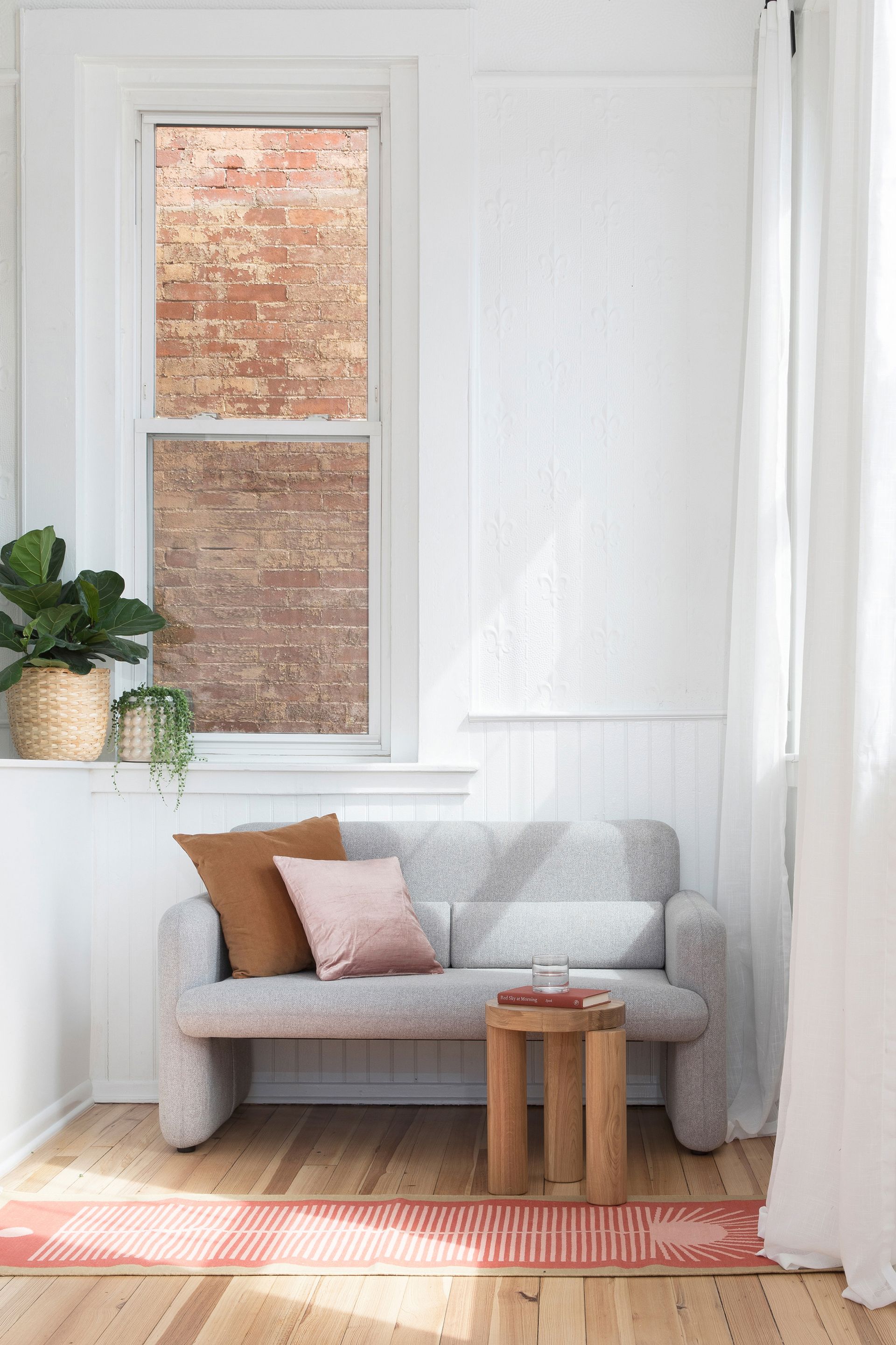 A small space with a fitted bespoke sofa