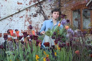 Arthur Parkinson in his flower garden