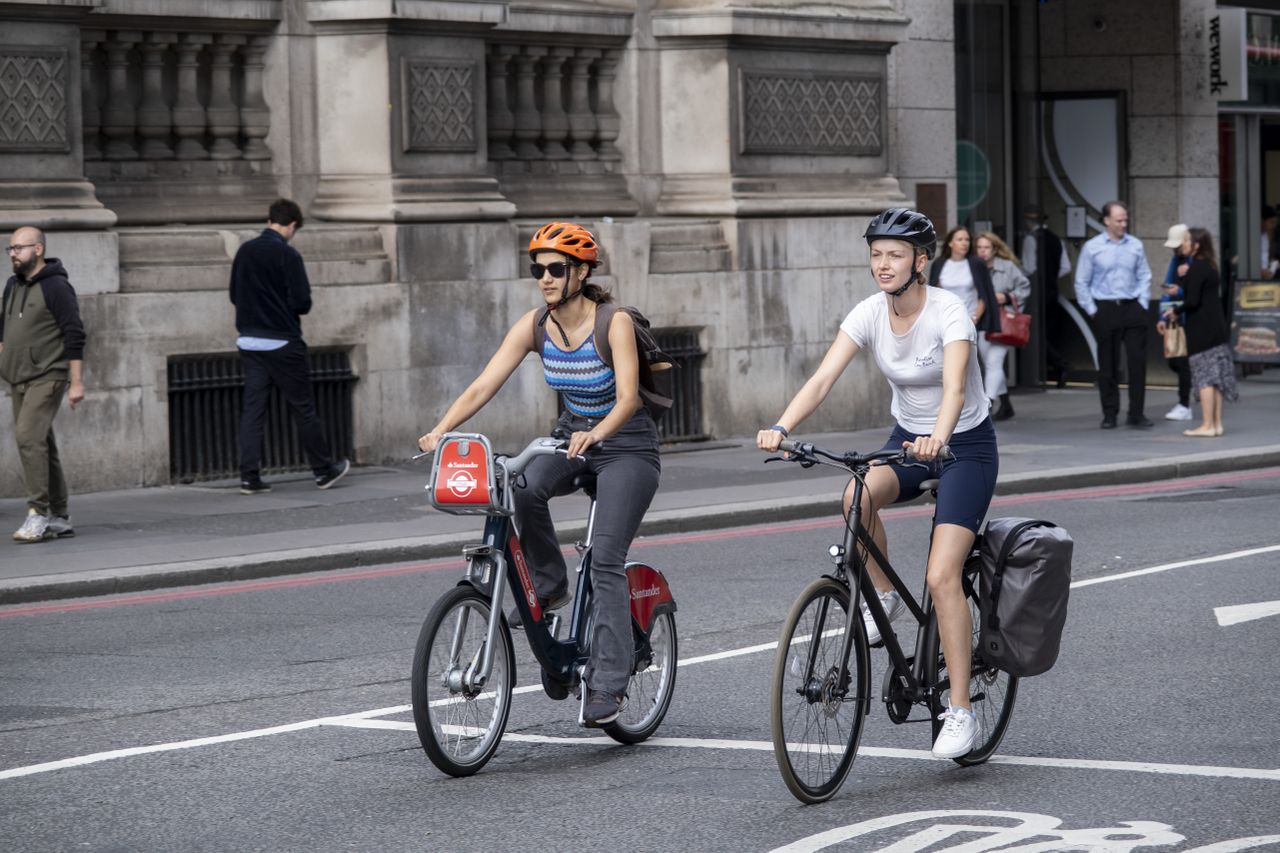 Women cycling in London