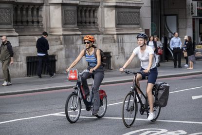 Women cycling in London