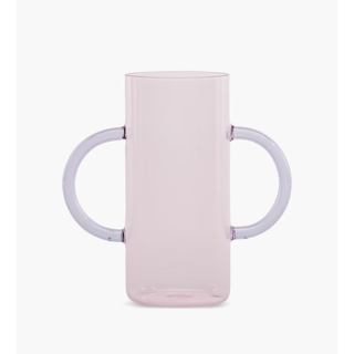 pink glass vase with large thin lilac handles on either side
