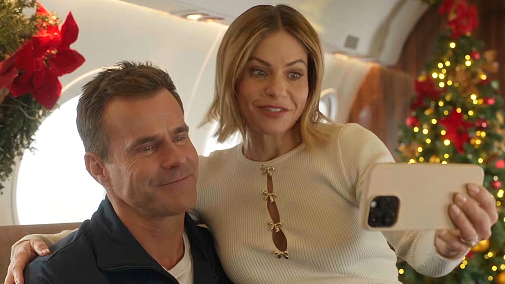 Cameron Mathison and Candace Cameron Bure are shown in Sweet Christmas Anniversary, part of GAF's Great American Christmas 2026.