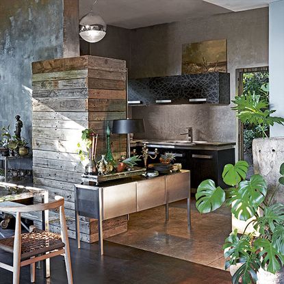 Step inside a concrete Cape Town home full of lush foliage and luxe ...