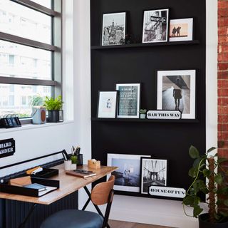 Industrial style home office with black wall