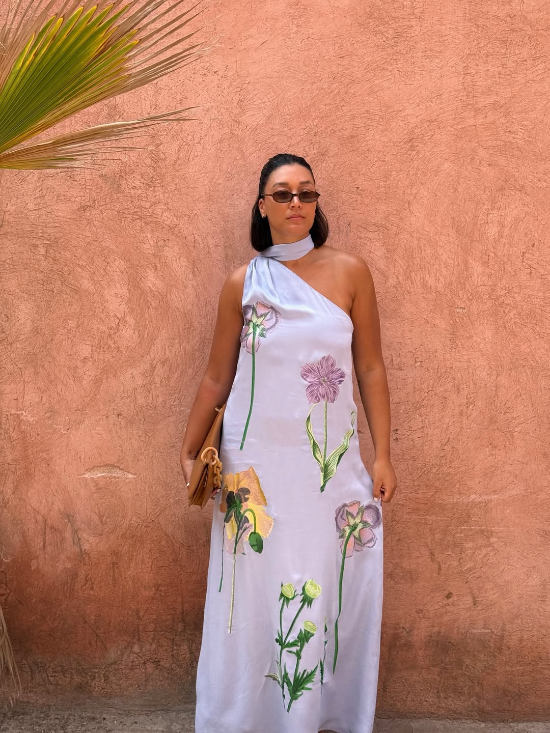 Influencer Tegan Frances wearing a lilac dress.