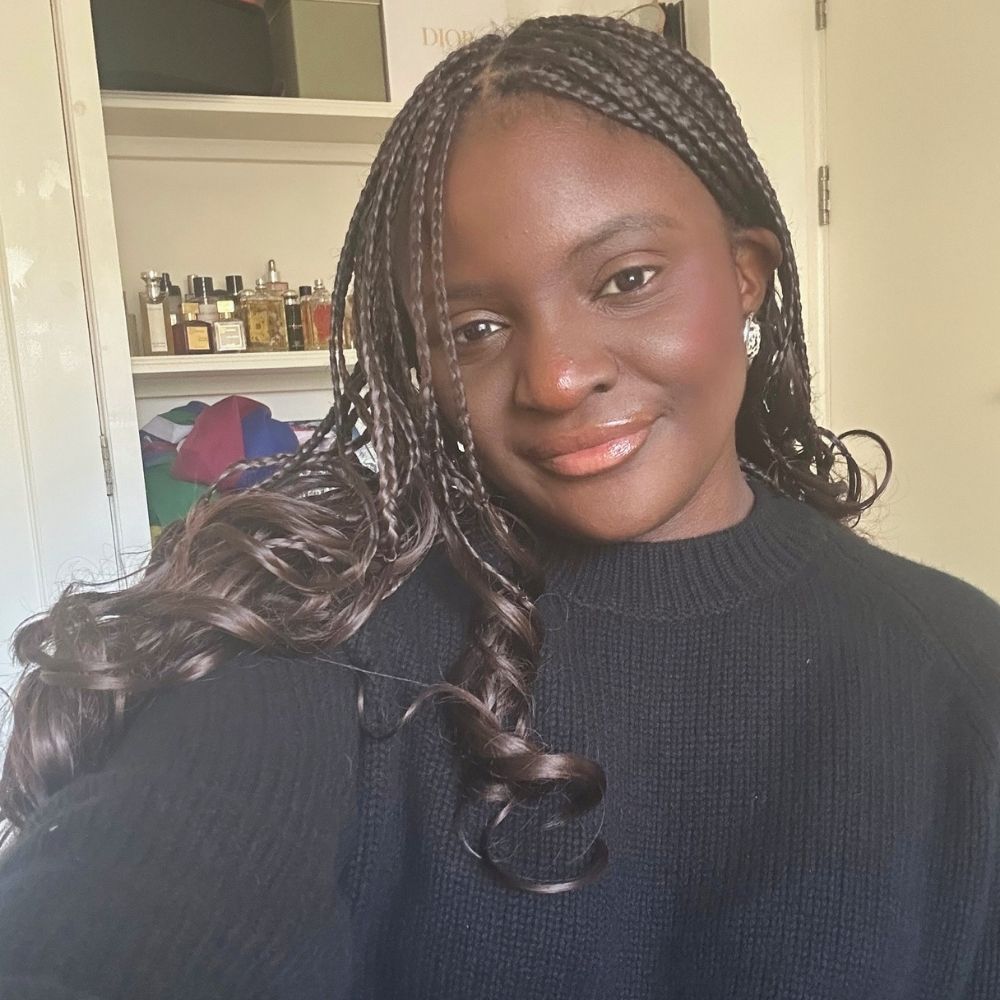 Who What Wear UK's Brittany Davy wearing the black COS Rounded Wool Crew-Neck Jumper in a Size M 