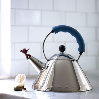 metal kettle with tea bag