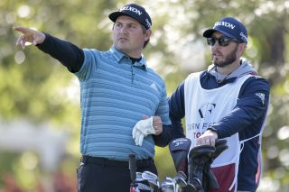 Andrew Novak chats to his caddie