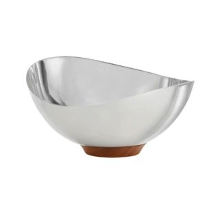 metallic bowl with wooden base