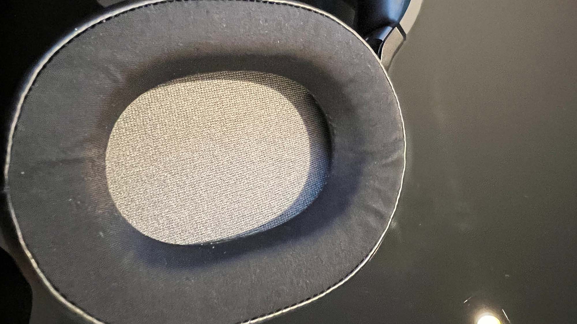 A close up of the earcup of the Corsair HS65 Surround