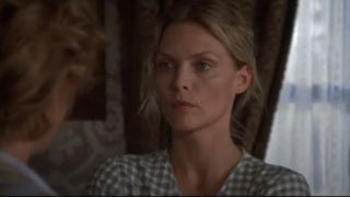 Michelle Pfeiffer looking serious in A Thousand Acres.