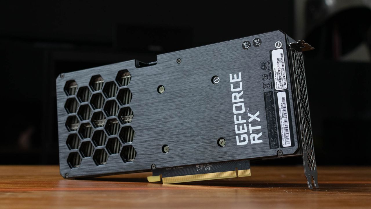 A photograph of the underside of the Palit RTX 3060 Dual stood up vertically on a table