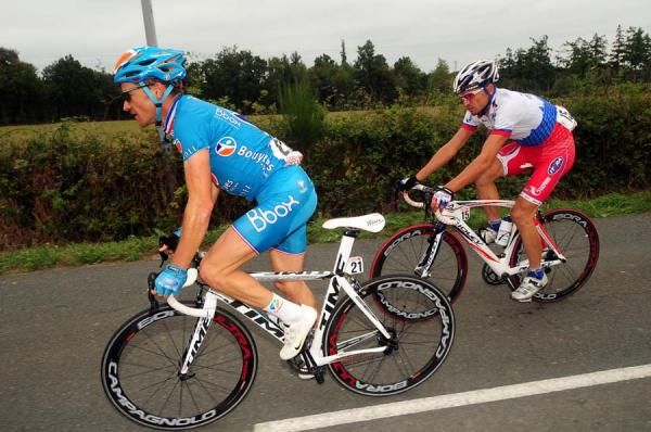 Thomas Voeckler (BBox Bougyues Telecom) and Sergei Ivanov (Katusha) ride alongside one another.