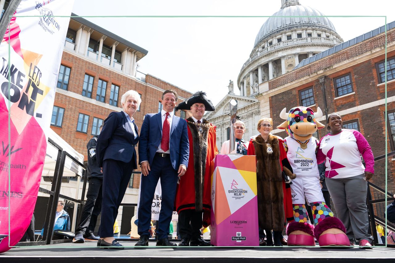 A photograph of Birmingham 2022 officials and mascot at the Queen&#039;s Baton Relay