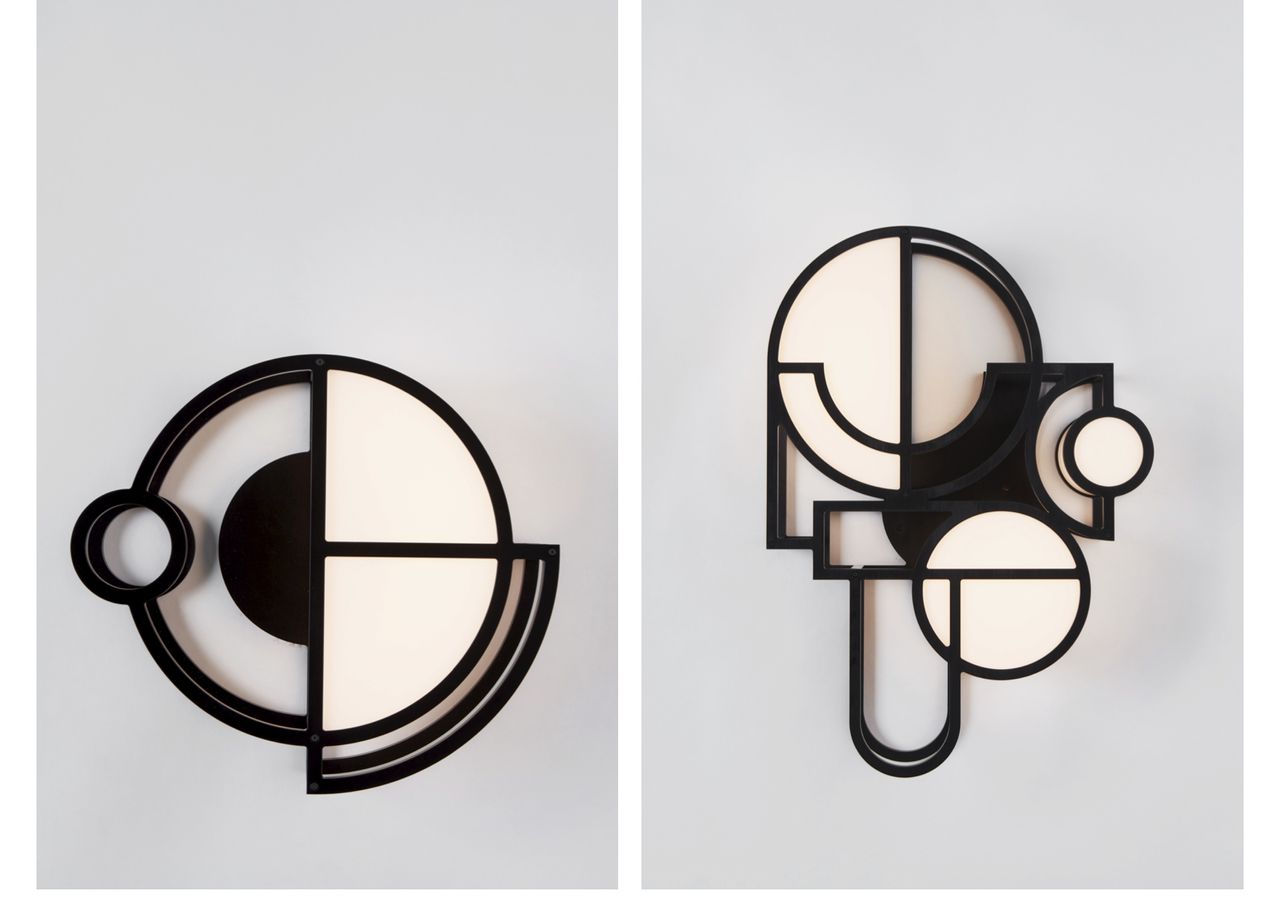 Two wall lights by Lara Bohinc for Roll &amp; Hill featuring geometric shapes in black anodised aluminium