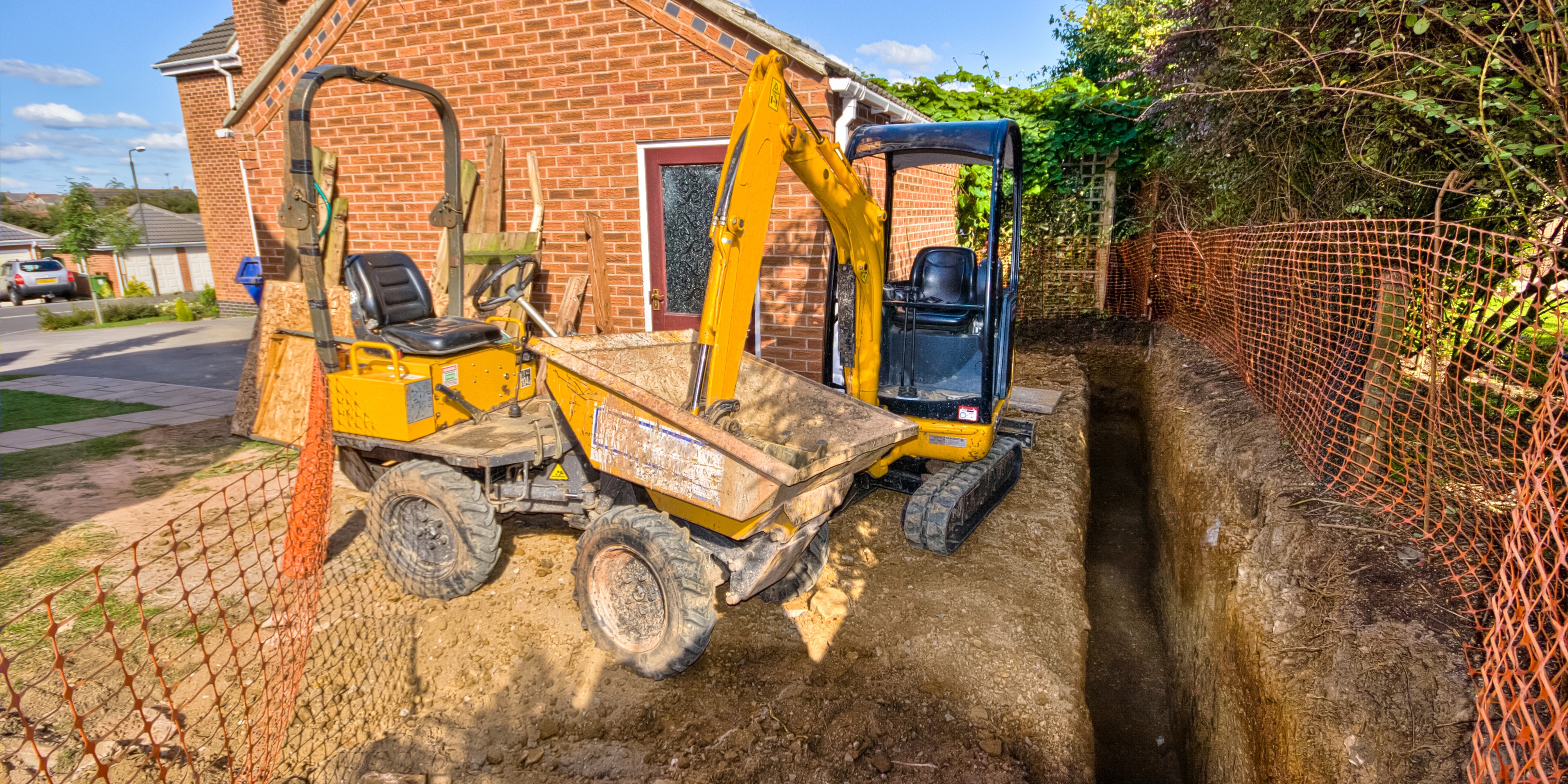 Excavating trenches for extension foundations