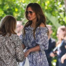 Jennifer Lopez spotted in Los Angeles wearing a floral dress and Charles & Keith Bag