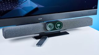 the insta360 is a black and grey video bar with 14 mics and a gimbal and 4k sensor, hdmi inputs and hdmi outputs, usb-c, usb-a, and bluetooth and wifi connectivity, perfect for medium-sized conference rooms