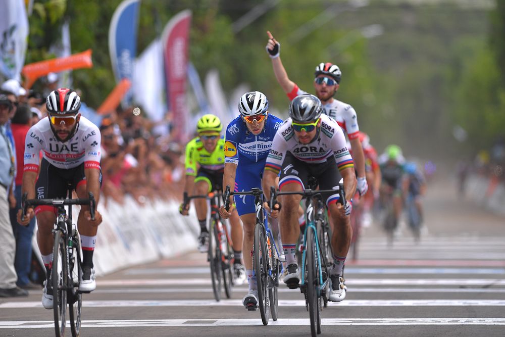 Simone Consonni celebrates Fernando Gaviria's win in San Juan