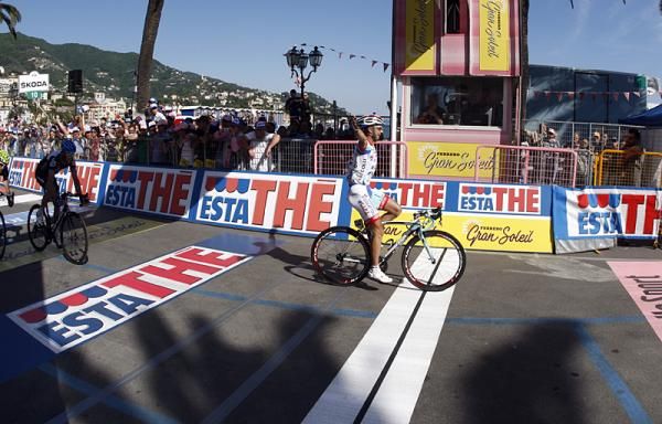 The finish line was eerily silent as Vicioso celebrates, having no idea that Weylandt had died.