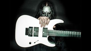 Mick Thomson with one of his signature Jackson Soloist models
