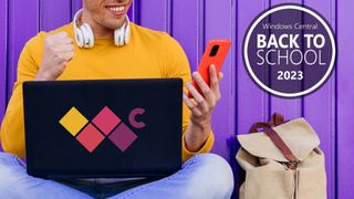 Smiling man using a laptop and smartphone promotion for back to school season 2023