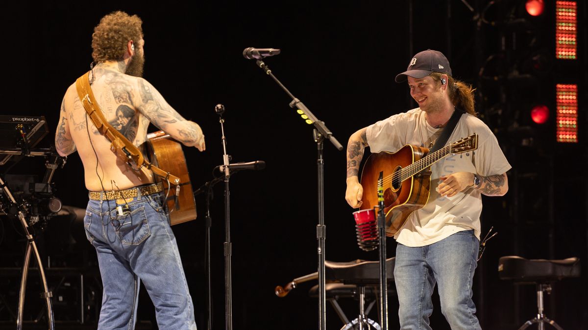 (L-R) Post Malone and Billy Strings perform during the 2024 Bonnaroo Music and Arts Festival on June 14, 2024 in Manchester, Tennessee