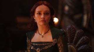 Olivia Cooke as Alicent Hightower wearing a green dress.