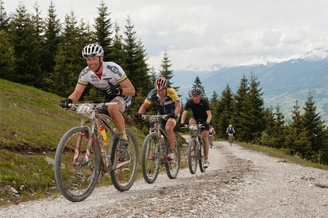 Racers near the top of a gravel climb in stage 3 of the Bike Four Peaks