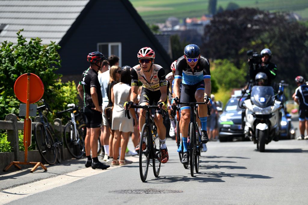 MAARKEDAL BELGIUM JUNE 15 Gianni Marchand of Belgium and Team Tarteletto Isorex and Timo De Jong of Netherlands and Volkerwessels Cycling Team compete in the breakaway during the 91st Baloise Belgium Tour 2022 Stage 1 a 165km stage from Merelbeke to Merelbeke BaloiseBelgiumTour on June 15 2022 in Maarkedal Belgium Photo by Luc ClaessenGetty Images