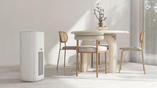 An air purifier standing in the middle of a living room