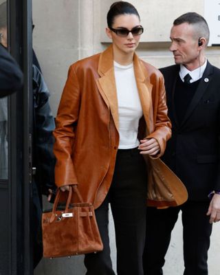 Kendall Jenner wears Hermès's 'Birkin' bag, outside Schiaparelli, during Haute Couture Spring-Summer 2025 as part of Paris Fashion Week on January 27, 2025 in Paris, France.