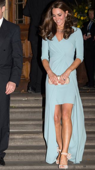 Kate Middleton, wearing a light blue dress, leaves the Wildlife Photographer of The Year 2014 Awards Ceremony